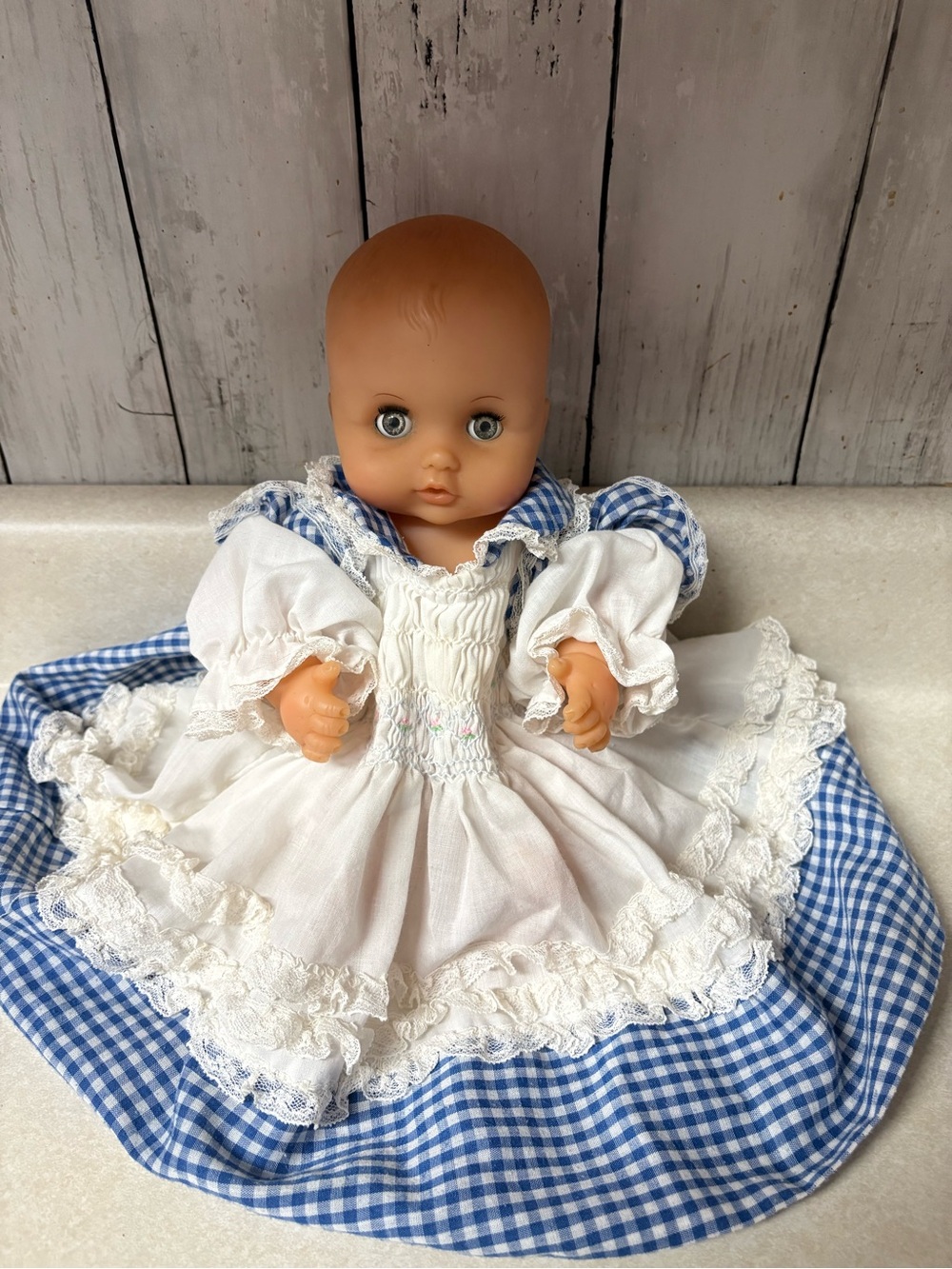 Vintage-Style Baby Doll in White Lace smocked Dress with Blue Gingham Skirt